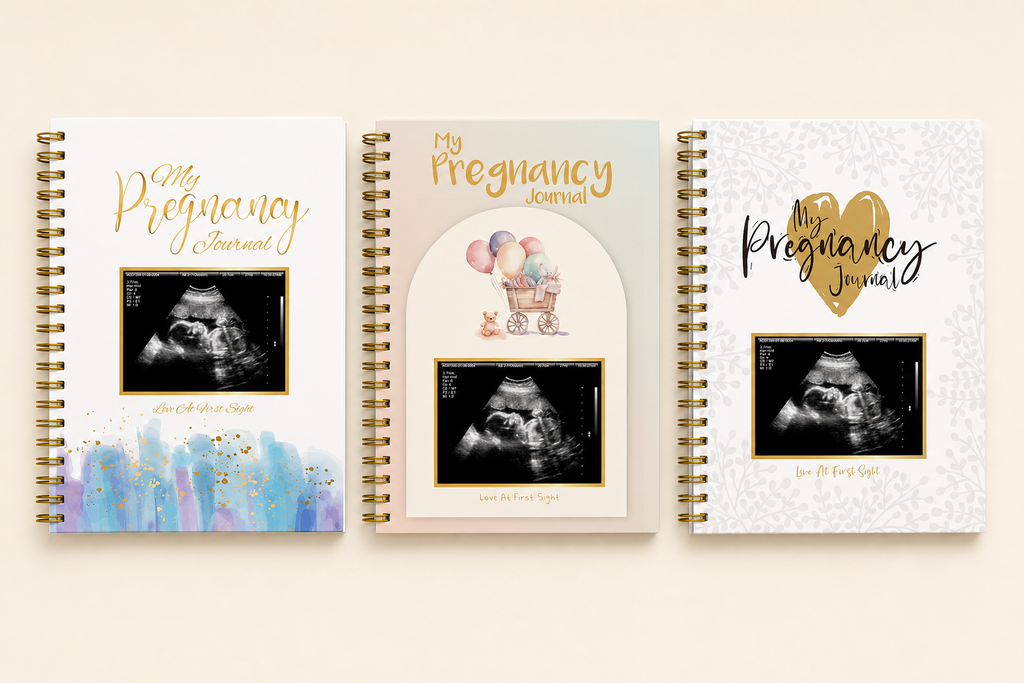 Comparison of Blue Baby Carriage and Gold Heart pregnancy journal covers