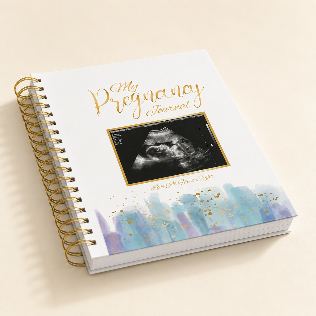 Close-up of the TISAYN pregnancy journal gold spiral binding and pages